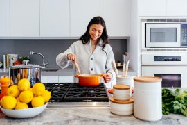 woman cooking in a cookware